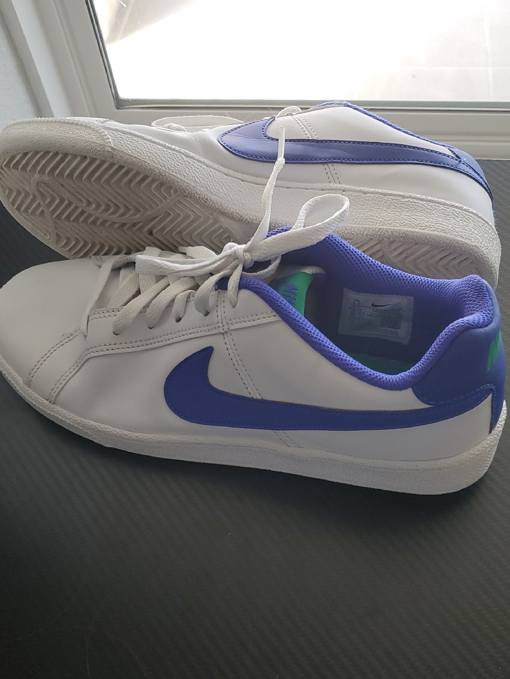 Nike Men’s White Sneakers with Purple Accents
